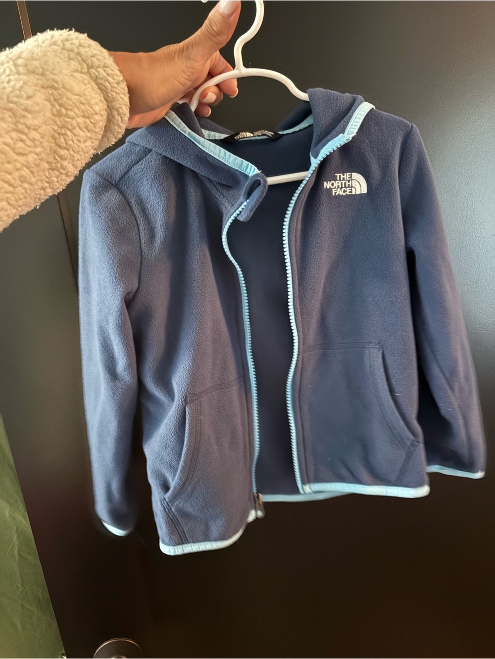 The North Face Kids Navy Blue Hooded Fleece Jacket with Light Blue Trim